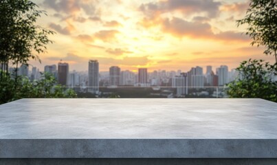 Obraz premium A concrete surface with a city skyline and sunset in the background, ideal for presentations.
