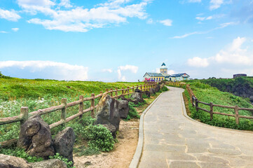 Seopjikoji, a scenic gem on Jeju Island, Korea, enchants visitors with its dramatic cliffs,...