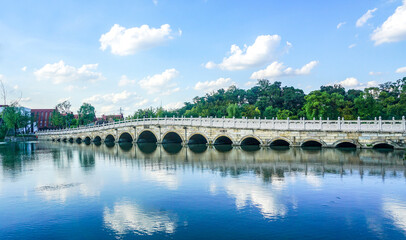 A traditional Chinese arch bridge, known for its elegant curves and timeless design, embodies ancient craftsmanship and cultural heritage.






