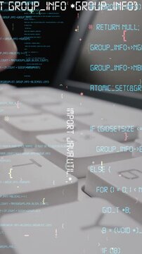 Creative visual of computer programming coding and software development shown by man working on computer keyboard with overlay of computer graphic displaying abstract program codes and computer script