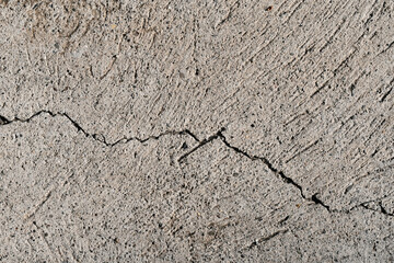 Obraz premium Dirty cracked concrete wall texture background. Scratches on wall. 