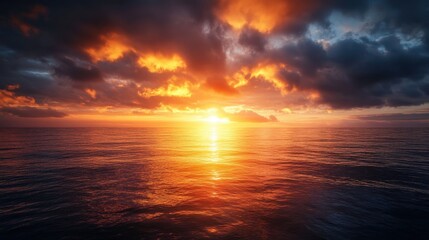Obraz premium Fiery Sunset over Calm Ocean Dramatic Golden Hour Seascape with Vivid Clouds
