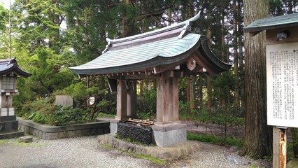 Construction for hand washing in the temple in Japan. Atmospheric shrine architecture