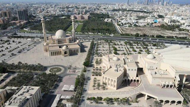 Camera drone orbiting above the Isa Cultural Centre, Al Fateh Grand Mosque, and Al-Qudaibiya Palace, Manama, Bahrain