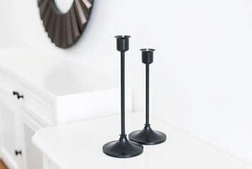 Black Metal Candle Holders A pair of slim black metal candle hol