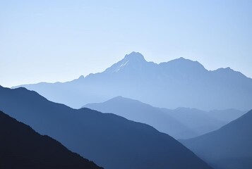 Obraz premium Silhouette of a majestic mountain range Evokes a sense of advent