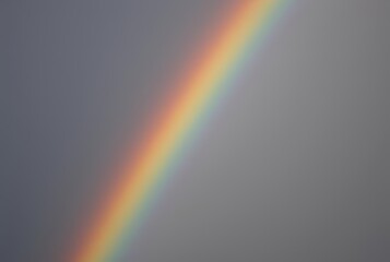 A rainbow with a narrow concentrated band of colors