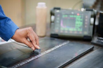 UT, Ultrasonic testing to detect imperfection or defect in welding of steel plate butt joint coupon for welder test quanlified. NDT Inspection.