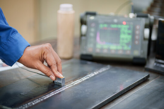 UT, Ultrasonic testing to detect imperfection or defect in welding of steel plate butt joint coupon for welder test quanlified. NDT Inspection.