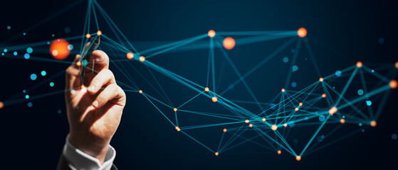 Hand of a person interacting with a network of digital connections in a technology concept. Dark blue background with light lines and dots.