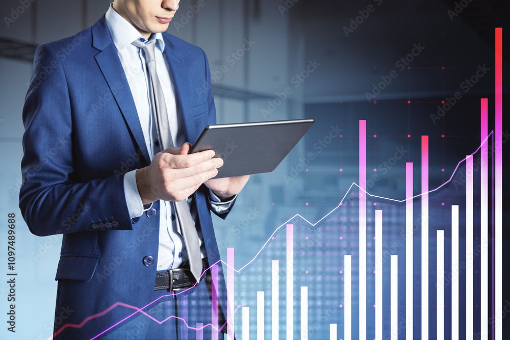 Poster businessman analyzing financial data on tablet with charts in office background.