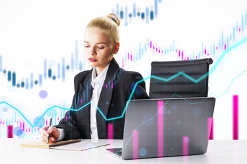 Businesswoman analyzing financial data with laptop and digital graphs on a white background.