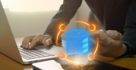 Data Organization icon, Document Management concept for system or process used to capture, track and store electronic documents. Businessman shows database icon with moving cycle on virtual screen.