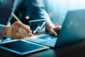 Property management and real estate investment and financial growth. Businessman using digital technology and online tools for real estate analysis, Profitable real estate investment strategies