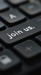 Close-Up of Keyboard Key with 'Join Us' Text