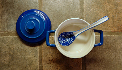 Asian style soup spoon with covered ramekin used for eating ramen, pho, wonton miso and the like   