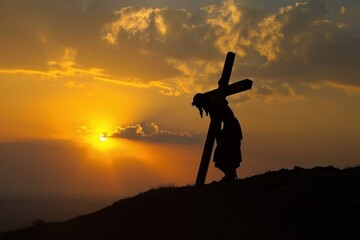 Silhouette of Jesus Christ carrying the cross on the hill backlighting outdoors sunset.