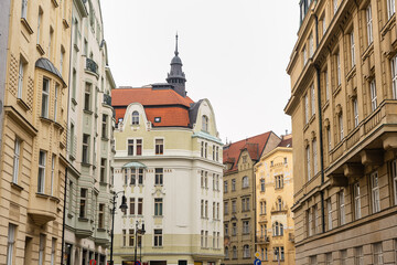 Facades of architecturally beautiful buildings in the Jewish quarter of the city of Prague, Czechia.