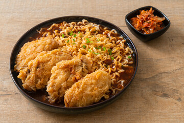 Korean instant noodles with fried chicken or Fried chicken ramyeon