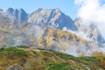 Happo Alpen Line Nature trail, Hakuba, Nagano, Japan, Mountain landscape with autumn foliage and mist