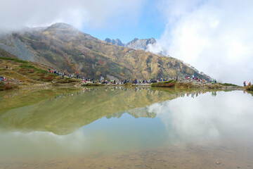 Happo pond, Happo Alpen Line Nature trail, Hakuba, Nagano, Japan, Serene mountain lake reflection scene