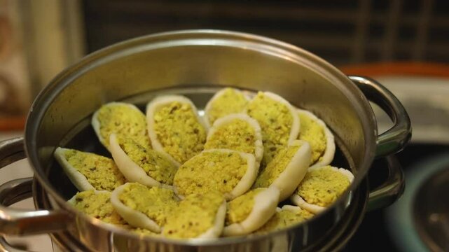 Steamed lentil fara in rice dough Indian style homemade dish.