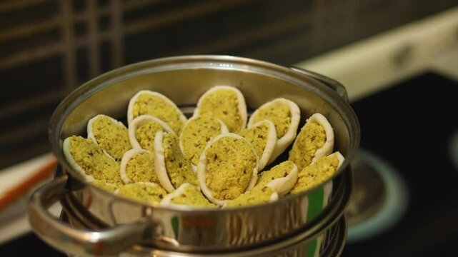 Steamed lentil fara in rice dough Indian style homemade dish.