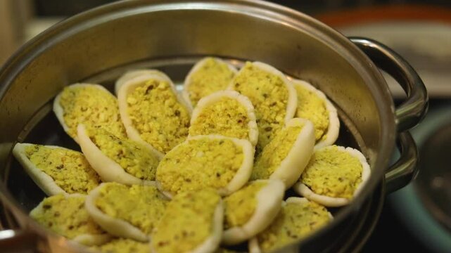 Steamed lentil fara in rice dough Indian style homemade dish.
