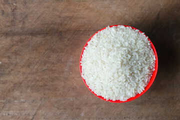 Rice
Rice in a bowl on a wooden background