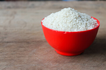 Rice
Rice in a bowl on a wooden background