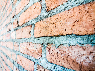 Red brick wall background image to use as a backdrop or as an example in your construction industry projects.