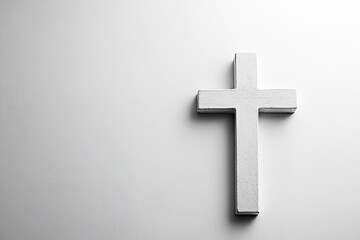 Minimalist white cross on a grey background