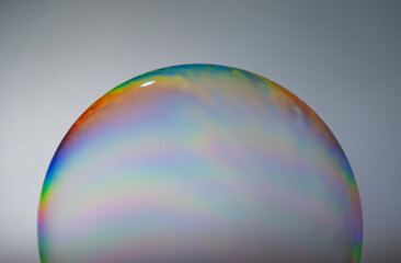 International Blowing Bubbles Day. NATIONAL BUBBLE WEEK. Soap bubbles isolated on a black background. Copy space.