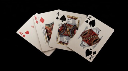 A striking arrangement of playing cards featuring two Kings and two Aces, set against a stark black background.