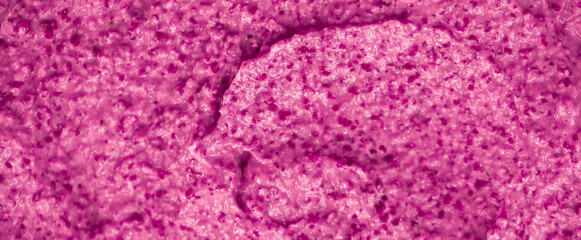 Purple berry yogurt ice cream. Fresh fruit and berry smoothie currant, pitaya, fig, grape, plum. Ice cream texture. Delicious sweet dessert close-up as background.