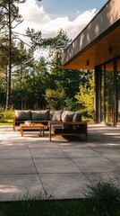 Modern outdoor living space featuring a stylish patio with comfortable seating, surrounded by lush greenery and natural light, ideal for relaxation and gatherings.