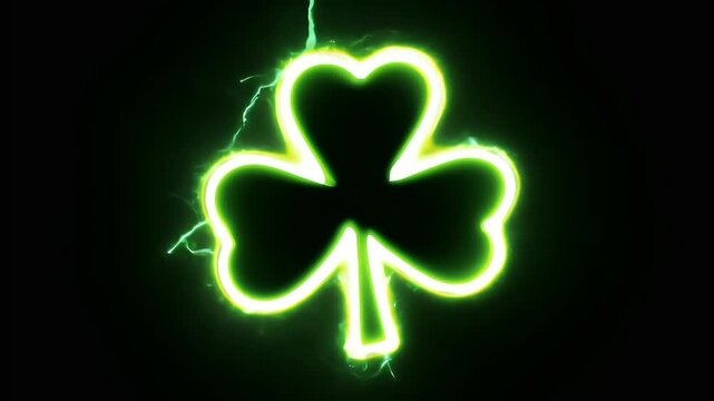 Green laser outline of a shamrock pulsating against a black background