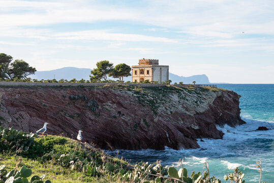 The Tower Alba or Tower of Cala Rossa, is a defense tower on the coast of the Mediterranean sea in Terrasini, province of Palermo, Sicily, Italy