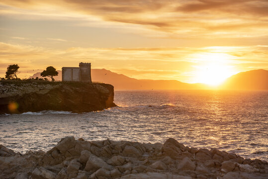 The Tower Alba or Tower of Cala Rossa, is a defense tower on the coast of the Mediterranean sea in Terrasini, province of Palermo, Sicily, Italy