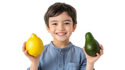 Studio shot of a smiling boy holding a fresh avacado and lemon on a transparent background. Healthy female nutrition concept. Isolated.