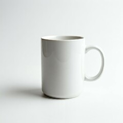 Obraz premium A plain white mug on a white background.