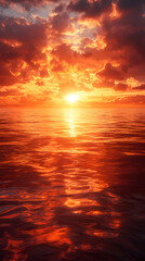 Fototapeta premium Tranquil Sunset Over Ocean with Dramatic Clouds and Vibrant Reflections in Calm Water