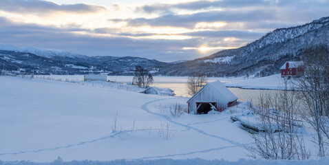 a lake in the snowy valley