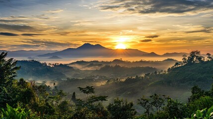 Fototapeta premium A scenic image of a sunrise behind a mountain range, symbolizing new beginnings and the start of the 