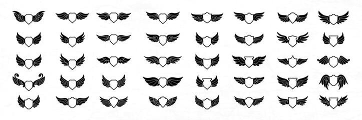 set of shield with wing decorated element vector design illustration	