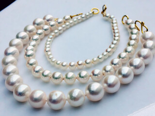 A Trio of Classic Designs and Elegant Pearl Bracelets.