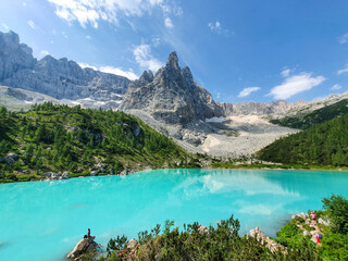 Breathtaking turquoise lake surrounded by majestic mountains Lago Di Sorapis Dolomites Italy
