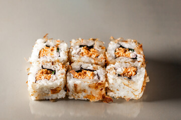 Sushi rolls. Japanese food in restaurant. Sushi roll set with salmon, vegetables and rice. Asian food concept. Japanese cuisine.