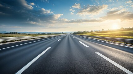 Fototapeta premium Empty highway stretching ahead through scenic landscapes, ideal for a classic road trip scene