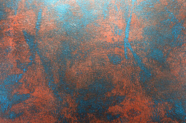 abstract art background of blue stains on red